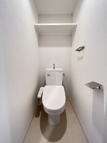 大阪市都島区高倉町１丁目の賃貸マンションのトイレ