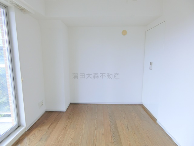 アールブラン久が原の寝室