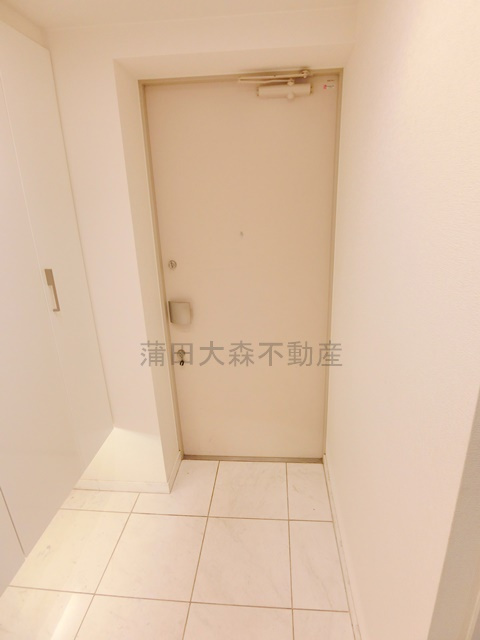 アールブラン久が原の玄関