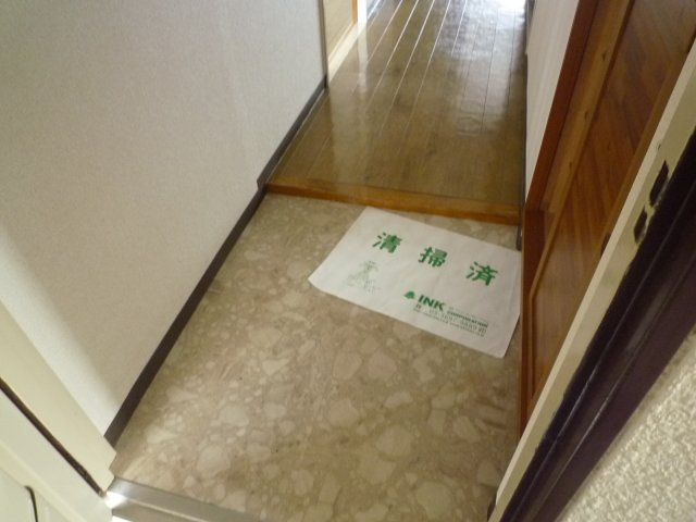 クリスタルコーポ大島の玄関