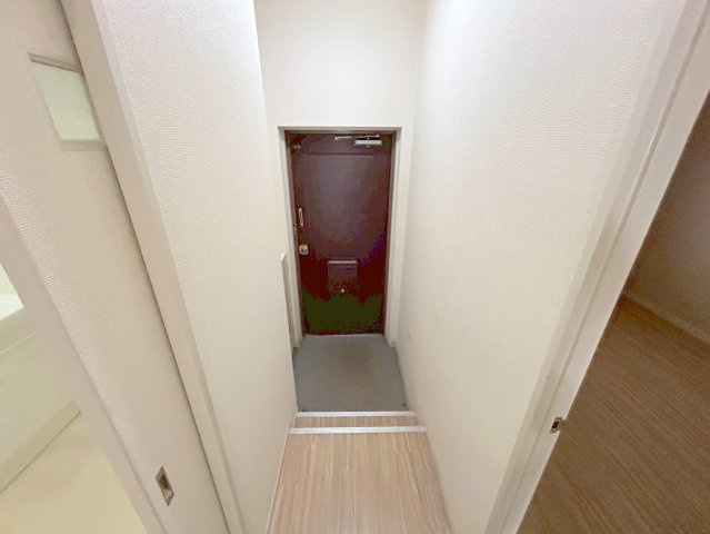 誼マンションの玄関