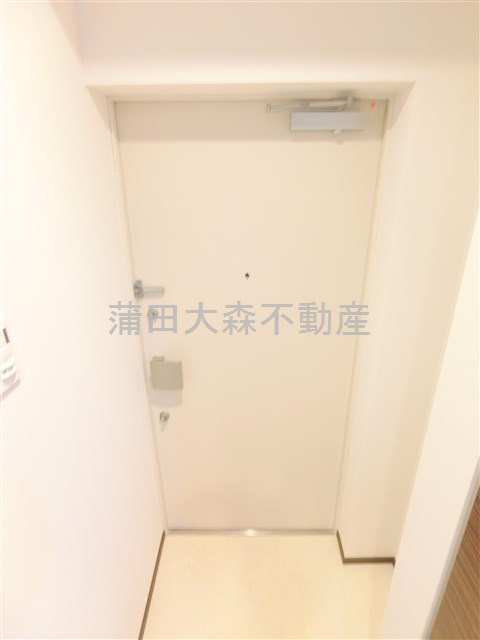 GENOVIA本羽田skygarden（ジェノヴィアホンハネダスカイガーデンの玄関
