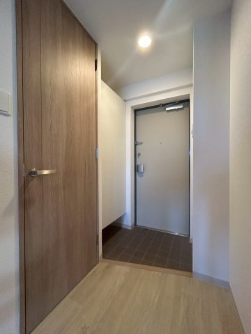 マンションはりげん鳳の玄関