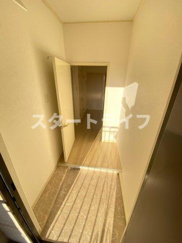 大阪市東淀川区下新庄４丁目の賃貸マンションの玄関