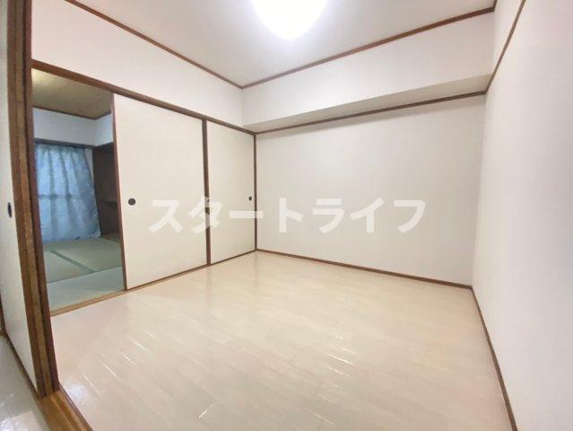 大阪市淀川区東三国６丁目の賃貸マンションの寝室