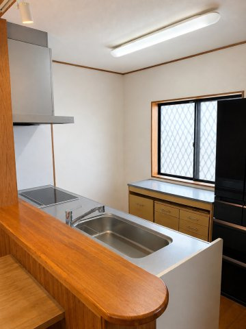 沖縄市高原7丁目のキッチン|AIで家具を消しています。