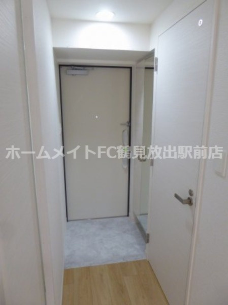 大阪市東成区深江北２丁目の賃貸マンションの玄関
