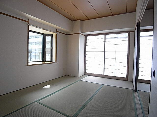 ジョイフル寝屋川の洋室