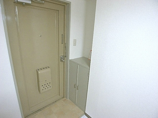 ロータリーマンション香里北之町の玄関