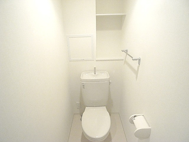 寝屋川市香里西之町の賃貸マンションのトイレ