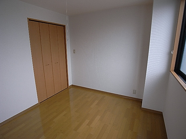 アーカンシェル東寝屋川の洋室