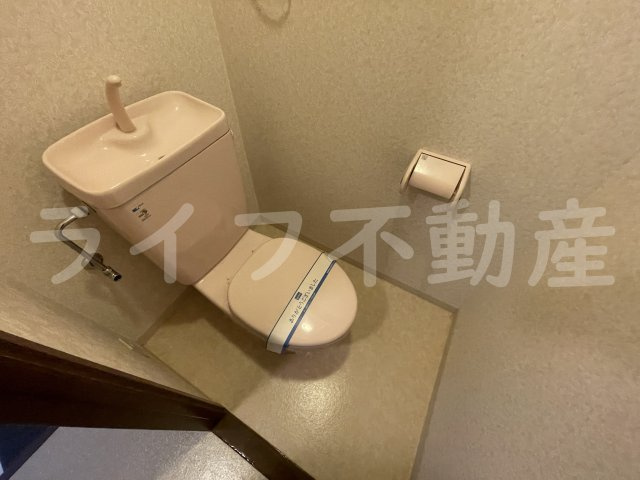ピスケス花園のトイレ|落ち着いた色調のトイレです