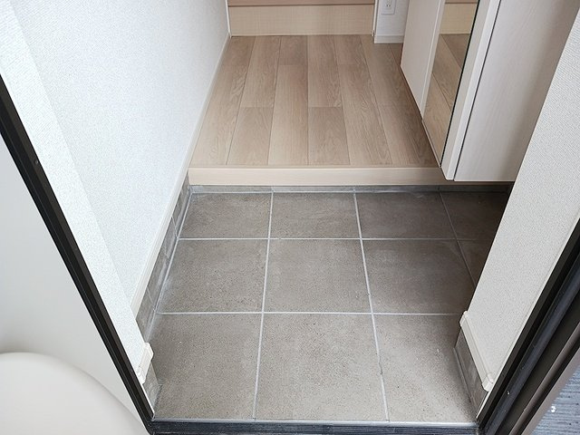 サンライズ　リバー　ＮＫの玄関