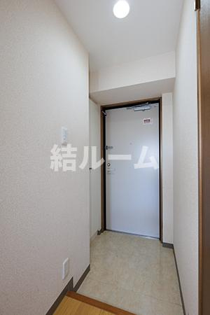 北区西が丘３丁目の賃貸マンションの玄関
