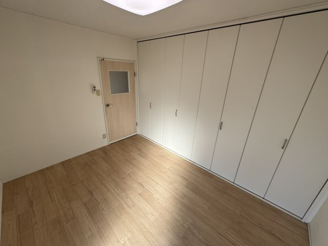 コープマンション舟津の洋室