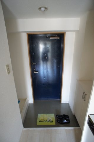 辻ハイツの玄関