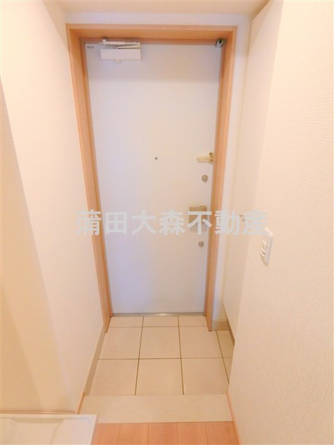 プレール・ドゥーク羽田WESTⅡの玄関
