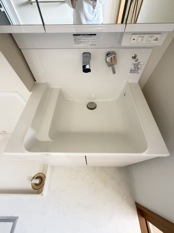 ハートフル湊川1号棟の洗面所