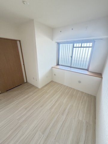 ハートフル湊川1号棟の寝室