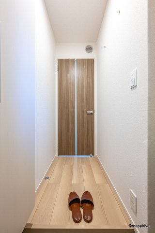 ファビオネスト駒沢の玄関