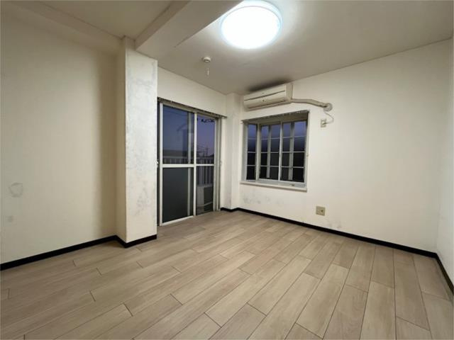 稲城市矢野口の賃貸マンションの居間・リビング