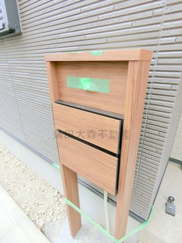 多摩川の甘風つむぐ青空のココルの玄関