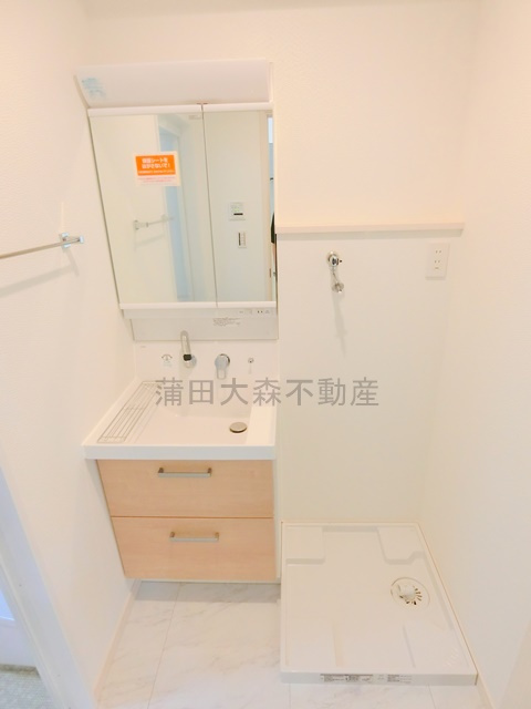 多摩川の甘風つむぐ青空のココルの洗面所|洗面脱衣所　独立洗面台　洗濯機置き場