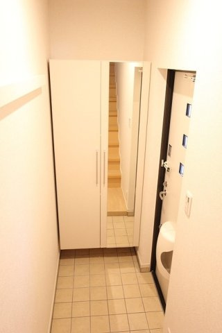 プチメゾン松和花壇の玄関