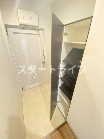 大阪市淀川区木川西１丁目の賃貸マンションの玄関