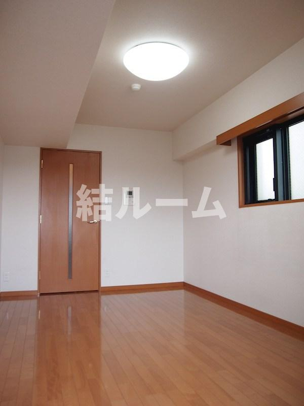 中野区沼袋４丁目の賃貸マンションの寝室