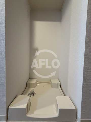 フォーリアライズ弁天町ノビアの洗面所|フォーリアライズ弁天町ノビア　洗濯機置き場