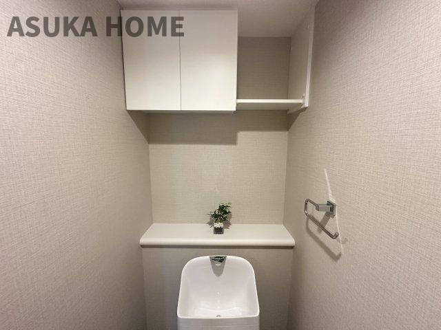 ライオンズガーデン鴨居の収納|トイレ上部にはあると便利な吊戸棚を設置！