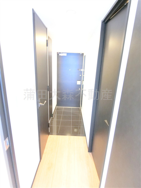 SPコート大森町の玄関