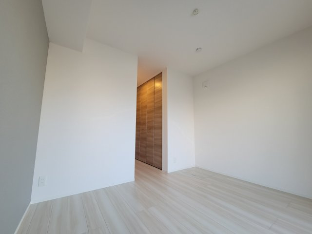エスペランサ西新町の寝室