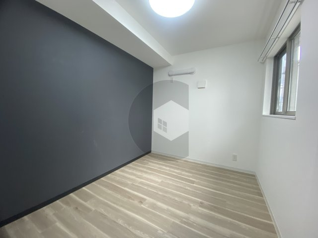 コーギレジデンス花園本町の洋室