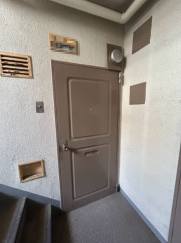 都島コーポの玄関