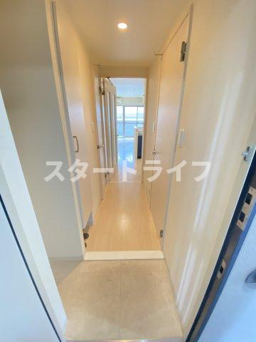 大阪市東淀川区西淡路２丁目の賃貸マンションの玄関
