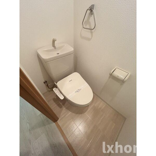 リラクシア千里のトイレ|落ち着いた色調のトイレです