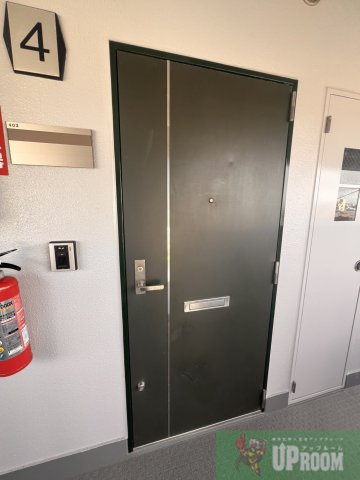 リバーシティ楠の玄関
