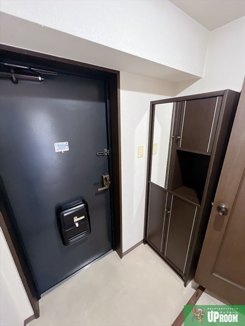 メゾン憧旗の玄関