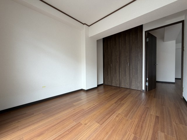 パルコートKUSAKAの寝室