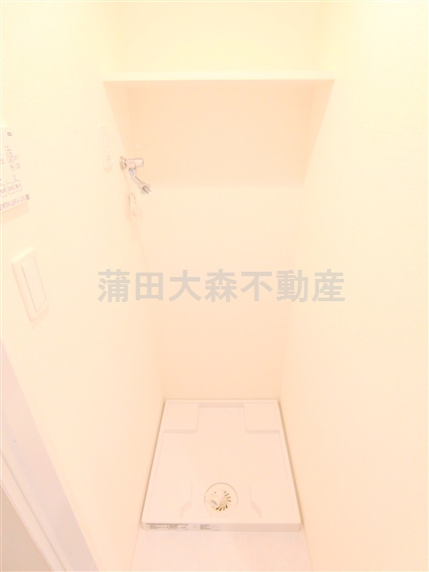 クレヴィスタ蒲田Ⅱの設備|棚付きの洗濯機置き場