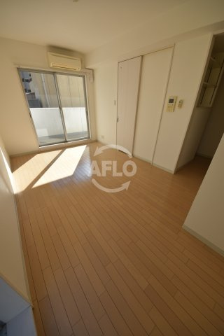 ジュネーゼ京町堀パークサイドの居間・リビング|ジュネーゼ京町堀パークサイド　洋室