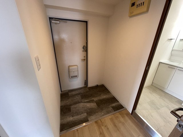 神戸市灘区箕岡通１丁目の賃貸マンションの玄関