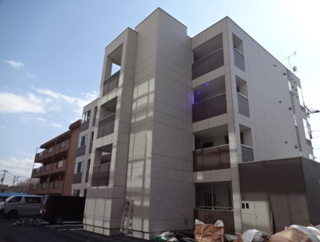 稲城市東長沼の賃貸マンションのエントランス