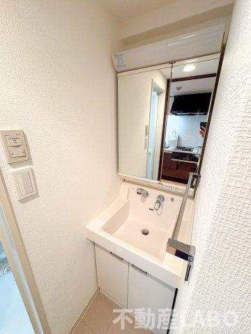 エクスクルーシブレジデンス西九条の洗面所