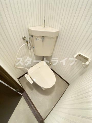 大阪市東淀川区東中島４丁目の賃貸マンションのトイレ