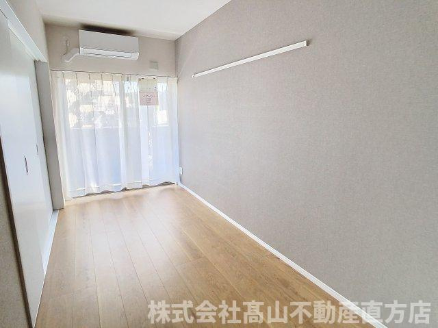 直方市大字感田の賃貸マンションの居間・リビング