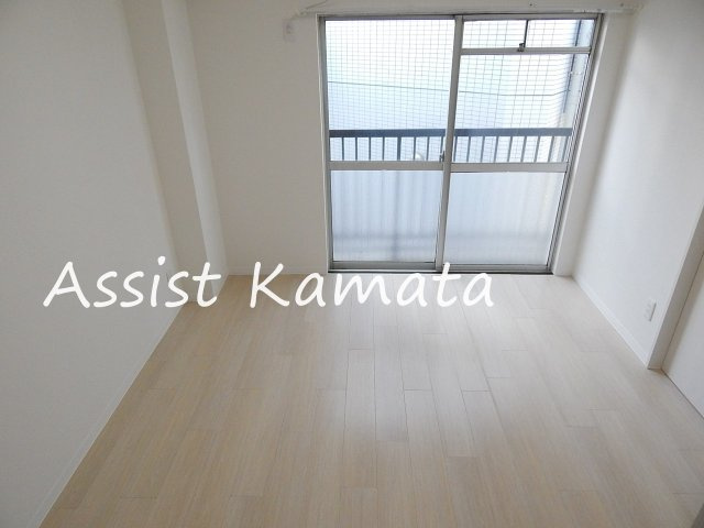高津マンションの寝室