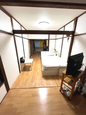 住吉南町1丁目の洋室|隣接した居室は、開放感のある続き間として活用